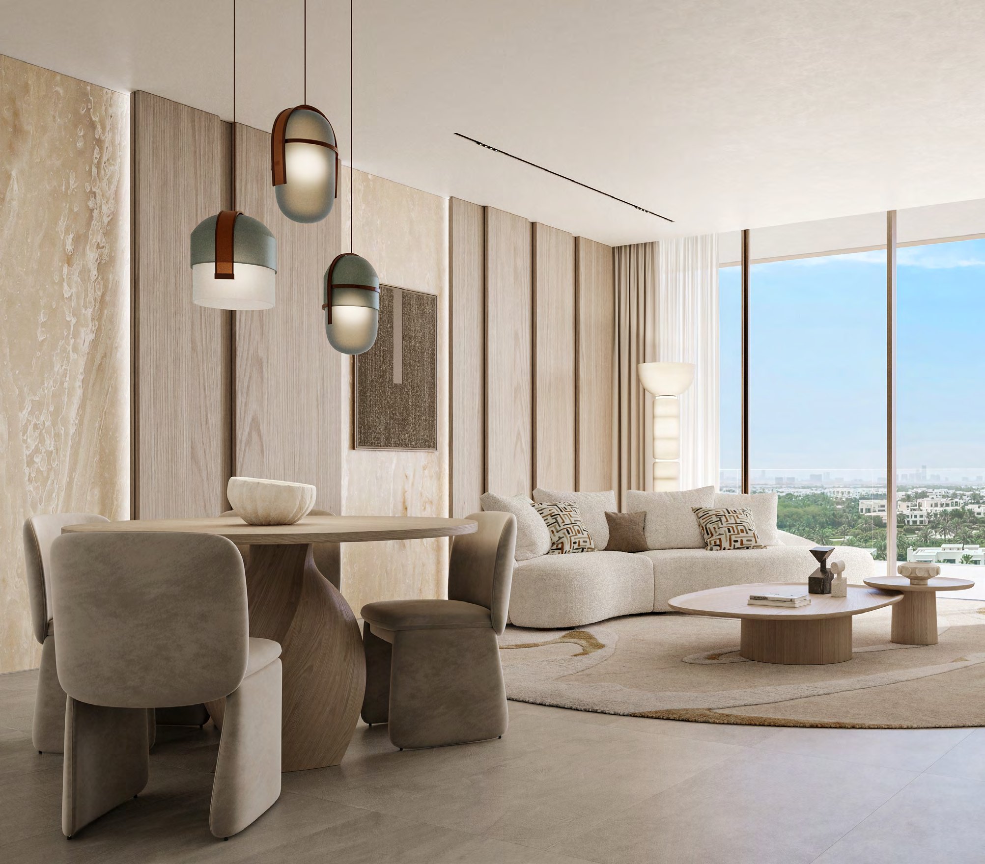 Living and dining room with stone walls, pendant lights and garden views